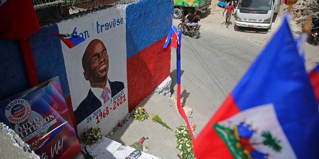 A mural depicts the late President Jovenel Moise on a wall in the Kenscoff district of Port-au-Prince, Haiti, on July 21, 2021. 