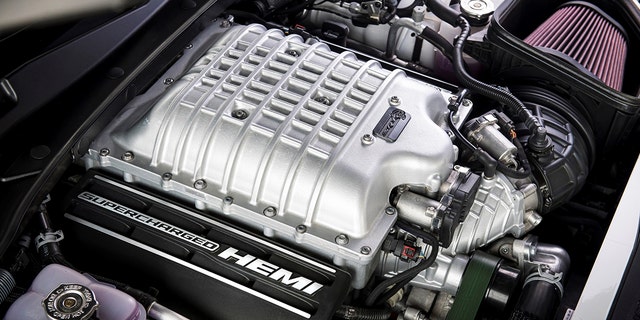 The supercharged 6.2-liter Hellcat V8 is available in the Dodge Challenger and Charger.