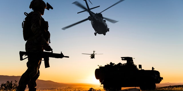military helicopter gun
