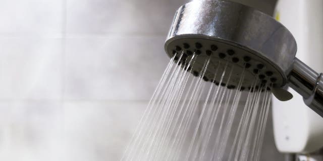 Shower head with water spraying