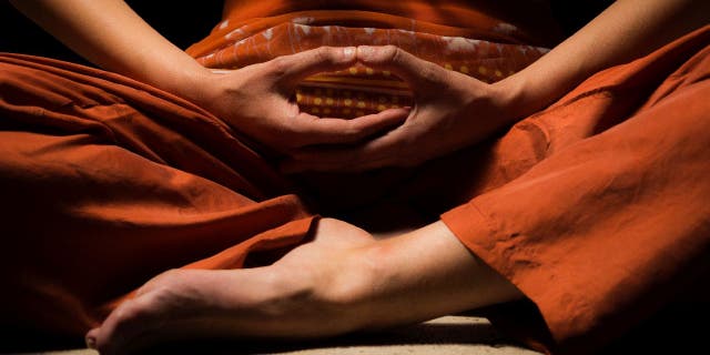The color orange is often associated with enlightenment and mindfulness in eastern religions and belief systems.