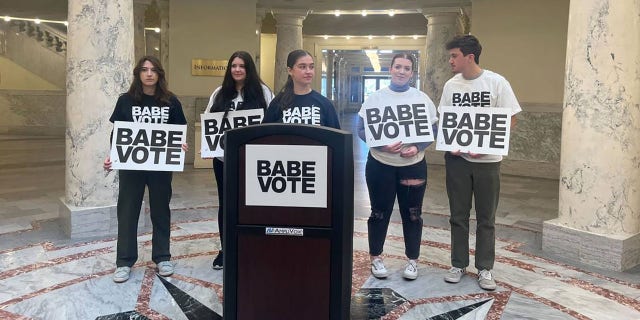 Supporters of BABE Vote, a student activist group, gathered at the Idaho Capitol, announcing a lawsuit to fight a new law that bans students from using student IDs to vote, on Friday, March 17, 2023, in Boise, Idaho.  (Mia Maldonado/Idaho Statesman/Tribune News Service via Getty Images)