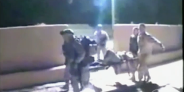 Pictures from the night of March 23, 2003, when Army Sgt. Hasan Akbar ambushed other U.S. military members, killing two and wounding 14 in Kuwait.