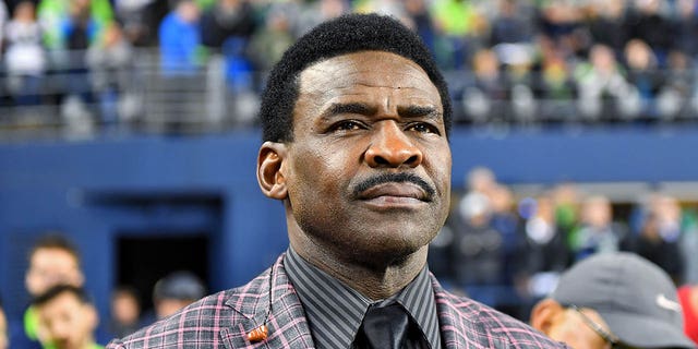 Hall of Fame wide receiver Michael Irvin watches a game between the Seattle Seahawks and the Los Angeles Rams at CenturyLink Field Oct. 3, 2019, in Seattle.