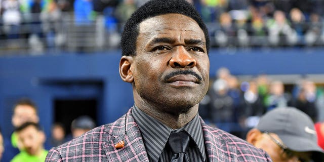 Michael Irvin on field