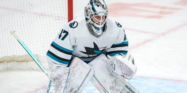 San Jose Sharks goaltender James Reimer guards the net during first period action against the Winnipeg Jets at Canada Life Center on March 6, 2023, in Winnipeg, Manitoba, Canada. 