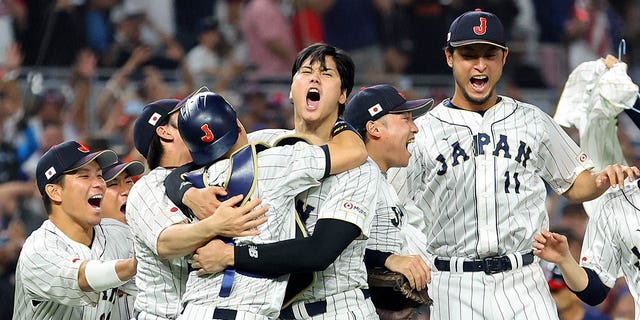 Team Japan celebrates after the final out of the World Baseball Classic Championship defeating Team USA 3-2 at LoanDepot Park on March 21, 2023 in Miami, Florida. 