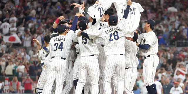 Team Japan celebrates after the final out of the World Baseball Classic Championship defeating Team USA 3-2 at loanDepot park on March 21, 2023, in Miami, Florida.