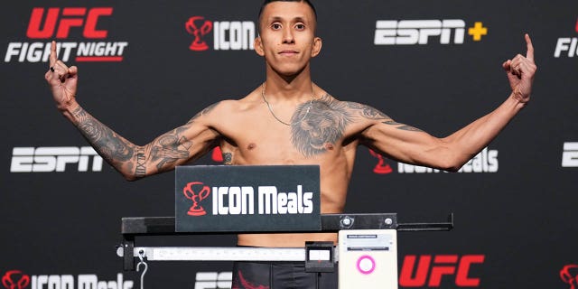 LAS VEGAS, NEVADA - JUNE 3: Jeff Molina poses on the scale during the UFC Fight Night weigh-in at UFC APEX on June 3, 2022 in Las Vegas, Nevada. 