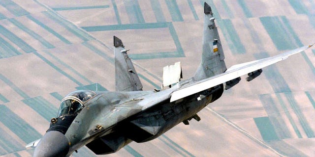 A Yugoslav airforce Mig-29 fighter flies over Belgrade in June 1998. Slovakia was offered 12 new military helicopters by the United States as compensation for the MiG-29 fighter jets the country decided to give to Ukraine.