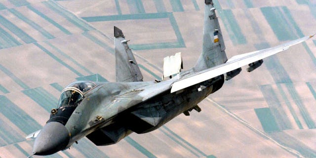 A Yugoslav airforce Mig-29 fighter flies over Belgrade in June 1998. Slovakia was offered 12 new military helicopters by the United States as compensation for the MiG-29 fighter jets the country decided to give to Ukraine.