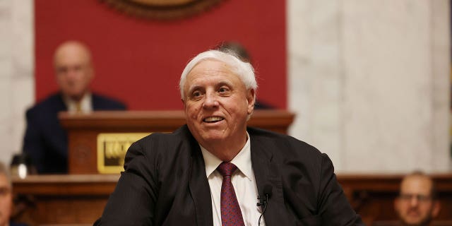 West Virginia Gov. Jim Justice delivers an address in Charleston on Jan. 11, 2023. Justice signed a law Wednesday that allows only children ages 16 and 17 to marry as long as they receive parental consent.