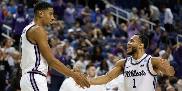 David N'Guessan, left, and Kansas State's Markquis Nowell celebrate during Montana State's game in the first round of the NCAA Men's Basketball Tournament on March 17, 2023 in Greensboro.