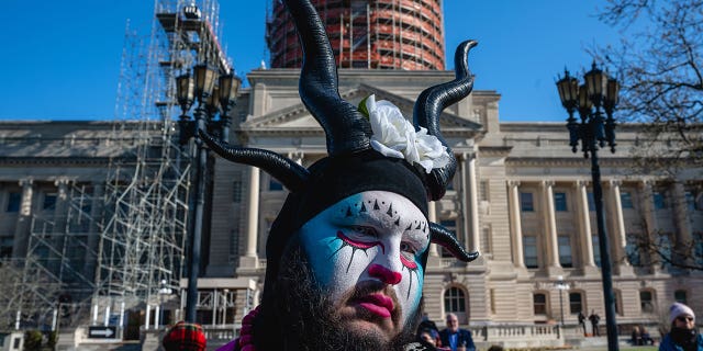 Ken Tagious, a genderqueer "clown nun"looks on during a rally to protest the passage of SB 150 March 29, 2023 at the Kentucky State Capitol in Frankfort, Kentucky.