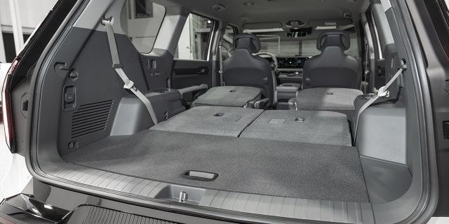 The EV9's second two rows of seats can be folded to create a flat load floor.