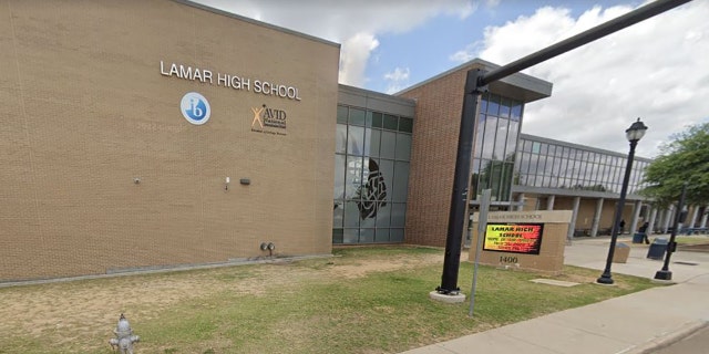 Lamar High School in Arlington, Texas, was put on lockdown early Monday after a shooting was reported outside the school building, police said.