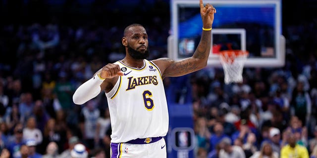 LeBron James of the Los Angeles Lakers reacts against the Dallas Mavericks at American Airlines Center Feb. 26, 2023, in Dallas.