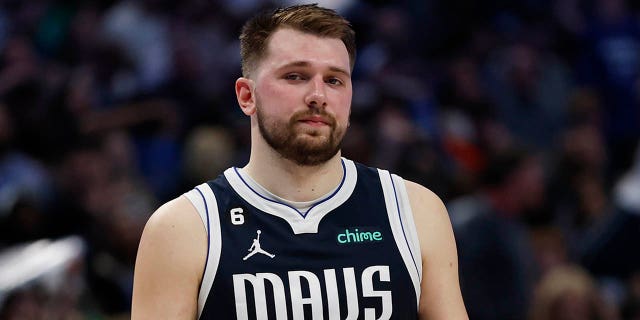 Luka Doncic, #77 of the Dallas Mavericks, reacts on the court in the second half against the Golden State Warriors at American Airlines Center on March 22, 2023, in Dallas, Texas.