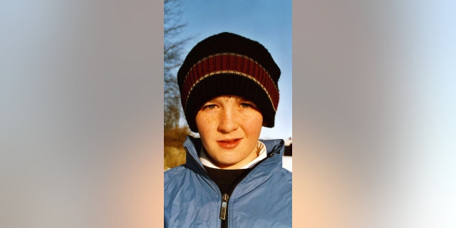 Cory McLeod at age 13 (2004). "I could be at a friend’s house and he’d have to drive over late at night to take the photo before midnight," McLeod said of his dad's commitment to the project for his son.