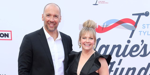 Melissa Joan Hart says she and husband Mark Wilkerson "consistently" go to therapy together. 