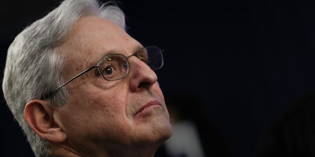 Attorney General Merrick Garland has said a federal law prohibiting people under a domestic violence restraining order from possessing firearms is constitutional.