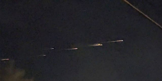 Streaks of light travel across the sky over the Sacramento, California, area on March 17, 2023.