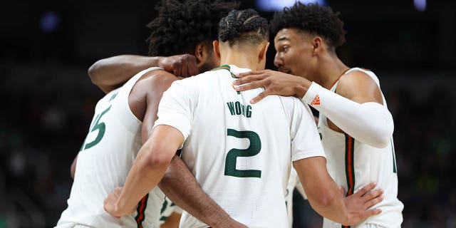 The Miami Hurricanes huddle against the Drake Bulldogs during the second half during the first round of the 2023 NCAA Men's Basketball Tournament held at MVP Arena on March 17, 2023, in Albany, New York. 