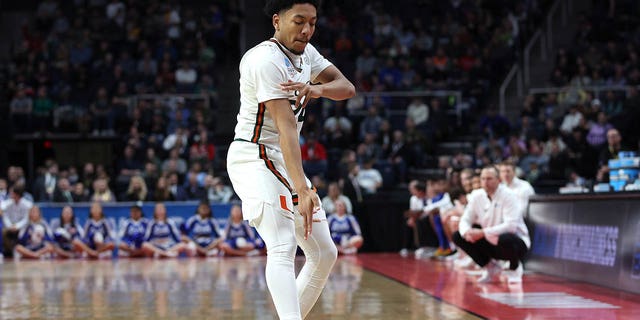 Nijel Pack #24 of the Miami Hurricanes celebrates after a basket in the second half against the Drake Bulldogs during the first round of the NCAA Men's Basketball Tournament at MVP Arena on March 17, 2023 in Albany, New York.
