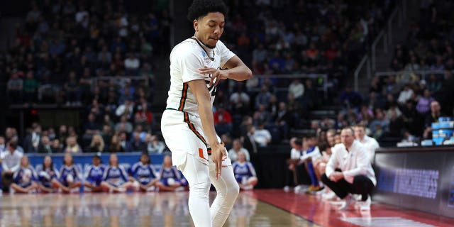 Nijel Pack #24 of the Miami Hurricanes celebrates after a basket in the second half against the Drake Bulldogs during the first round of the NCAA Men's Basketball Tournament at MVP Arena on March 17, 2023 in Albany, New York.