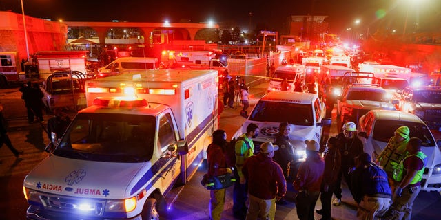 Ambulances, firefighters and vans from the morgue could be seen responding to the fire at a migrant detention facility in Ciudad Juarez, Mexico. 