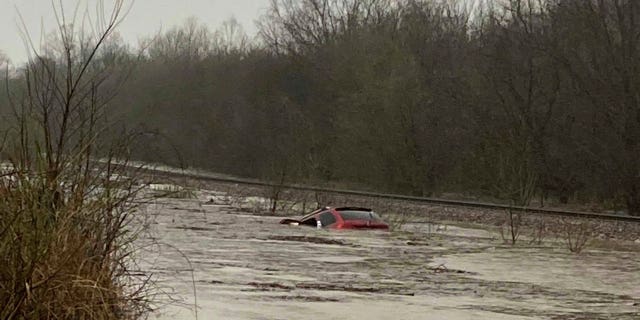 Two people have been reported dead in a Missouri flash flood as severe storms wreak havoc on the South.