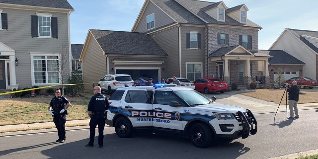 Officers arrived at the home in West Murfreesboro, Tennessee, and found the body of a woman with stab wounds in the garage.