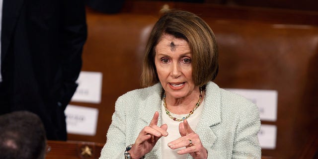Nancy Pelosi, a practicing Catholic, marks Ash Wednesday with ashes on her forehead. 
