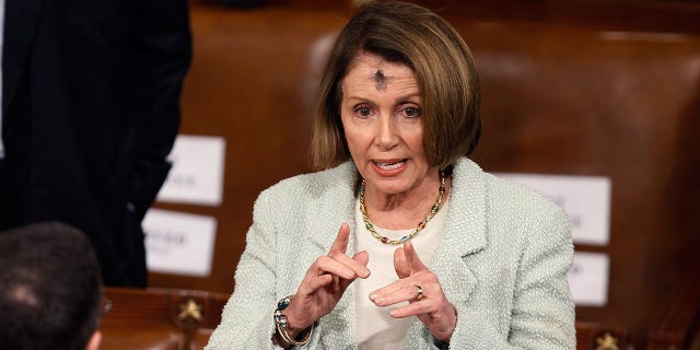 Nancy Pelosi, a practicing Catholic, marks Ash Wednesday with ashes on her forehead. 