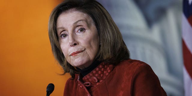 Former House Speaker Nancy Pelosi was heckled by protesters at a City University of New York event Monday.