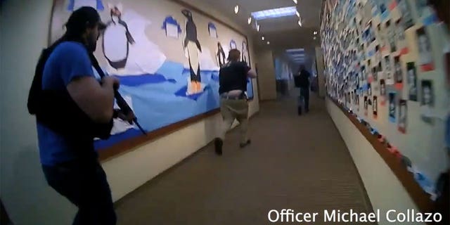 Bodycam footage shows Metro Nashville Police Department officers racing past bulletin boards that had been decorated by children as they respond to the Covenant School shooting after 28-year-old Audrey Hale opened fire.