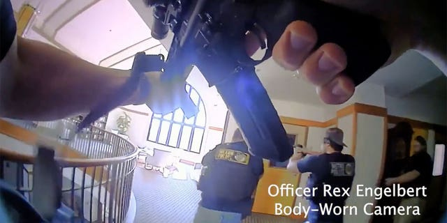 A still from bodycam footage shows Nashville Police Officer Rex Engelbert and other officers responding to the Covenant School in Nashville after 28-year-old Audrey Hale opened fire.