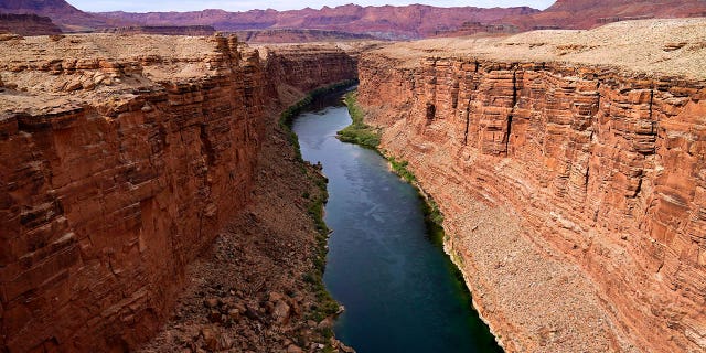 The Colorado River successful nan precocious River Basin is pictured successful Lees Ferry, Arizona, connected May 29, 2021.