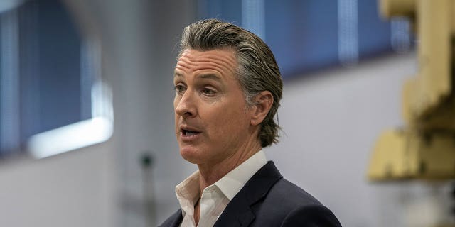 California Gov. Gavin Newsom speaks at a news conference in National City on March 19, 2023. Newsom asked lawmakers to pass a bill that would empower regulators to penalize oil companies for price gouging.