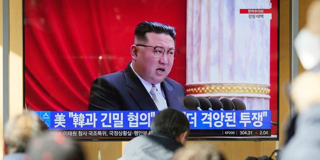 FILE: A TV screen shows a news program reporting with footage of North Korean leader Kim Jong Un in Pyongyang, at the Seoul Railway Station in Seoul, South Korea, on Dec. 27, 2022.