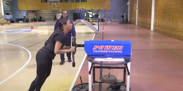 Woman going through the NYPD's multi-course job standards test