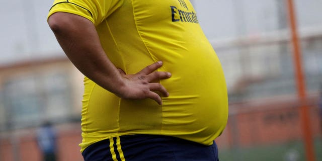 A player is seen during his "Futbol de Peso" (Soccer of Weight) league soccer match, a league for obese men who want to improve their health through soccer and nutritional counseling in Mexico on Sept. 16, 2017. 