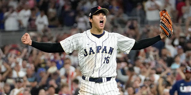 Shohei Ohtani #16 of Team Japan reacts after the final out of the Baseball Classic World Championship defeating Team USA 3-2 at Depot Loan Park on March 21, 2023 in Miami, Florida. 