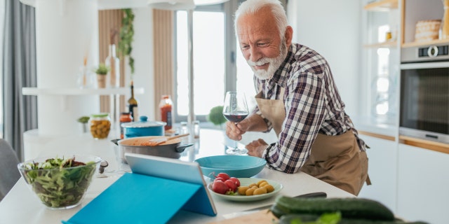 Older man cooking
