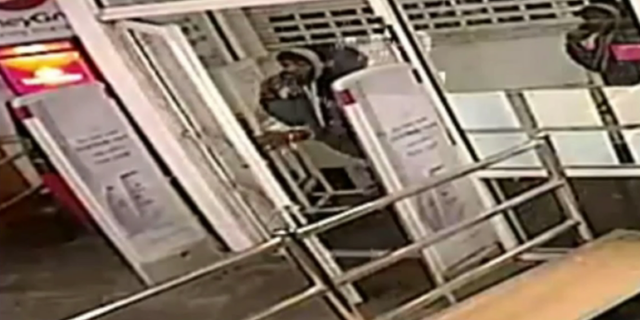 Surveillance video shows the suspect entering the East Germantown CVS at around 8:40 p.m.