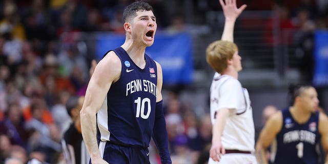 Andrew Funk #10 of the Penn State Nittany Lions reacts after the first half against the Texas A&M Aggies in the first round of the NCAA Men's Basketball Tournament at Wells Fargo Arena on March 16, 2023 in Des Moines.  Iowa. 