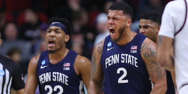 Jalen Pickett #22 and Myles Dread #2 of the Penn State Nittany Lions celebrate after a play during the second half against the Texas A&amp;amp;M Aggies in the first round of the NCAA Men's Basketball Tournament at Wells Fargo Arena on March 16, 2023 in Des Moines, Iowa. 