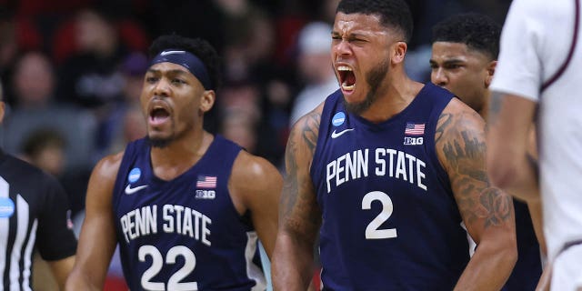 Jalen Pickett #22 and Myles Dread #2 of the Penn State Nittany Lions celebrate after a play during the second half against the Texas A& M Aggies in the first round of the NCAA Men's Basketball Tournament at Wells Fargo Arena on March 16, 2023 in Des Moines, Iowa.