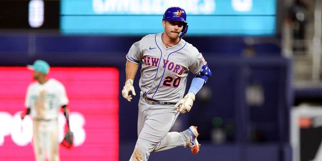 Pete Alonso of the New York Mets walks the bases after hitting a home run against the Miami Marlins during the ninth inning at LoanDepot Park on March 31, 2023 in Miami, Florida.