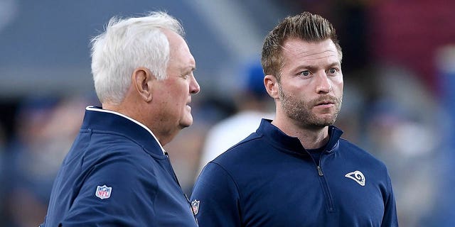 Los Angeles Rams head coach Sean McVay, right, speaks with defensive coordinator Wade Phillips before a game against the Baltimore Ravens at the Los Angeles Memorial Coliseum on November 25, 2019 in Los Angeles.